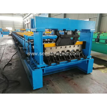 Steel build material decking floor forming machine